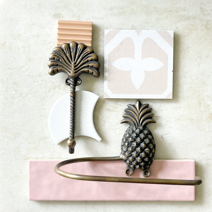 Fan palm hook  and pineapple toilet roll holder by Ocean Luxe
