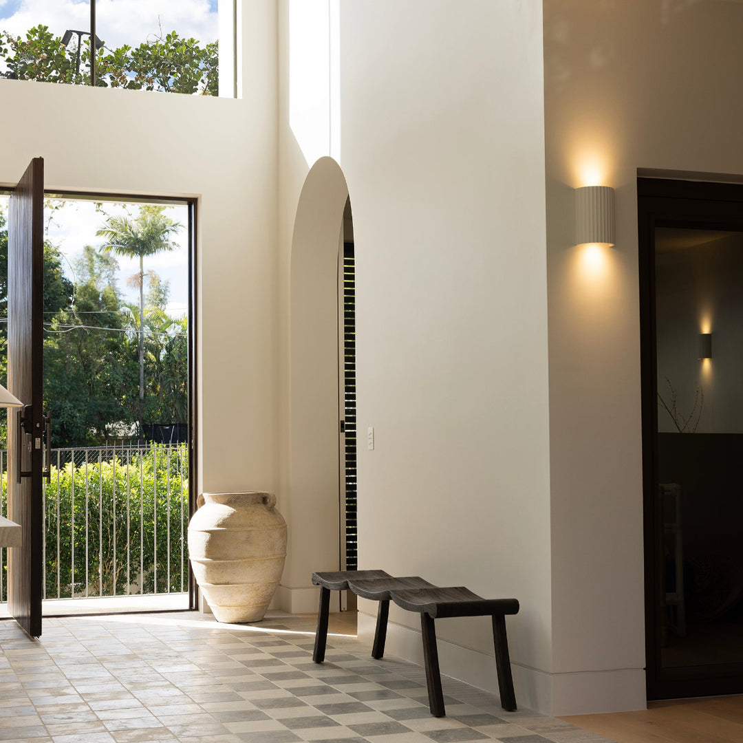 Orlando dark stain teak bench in entryway Ocean Luxe