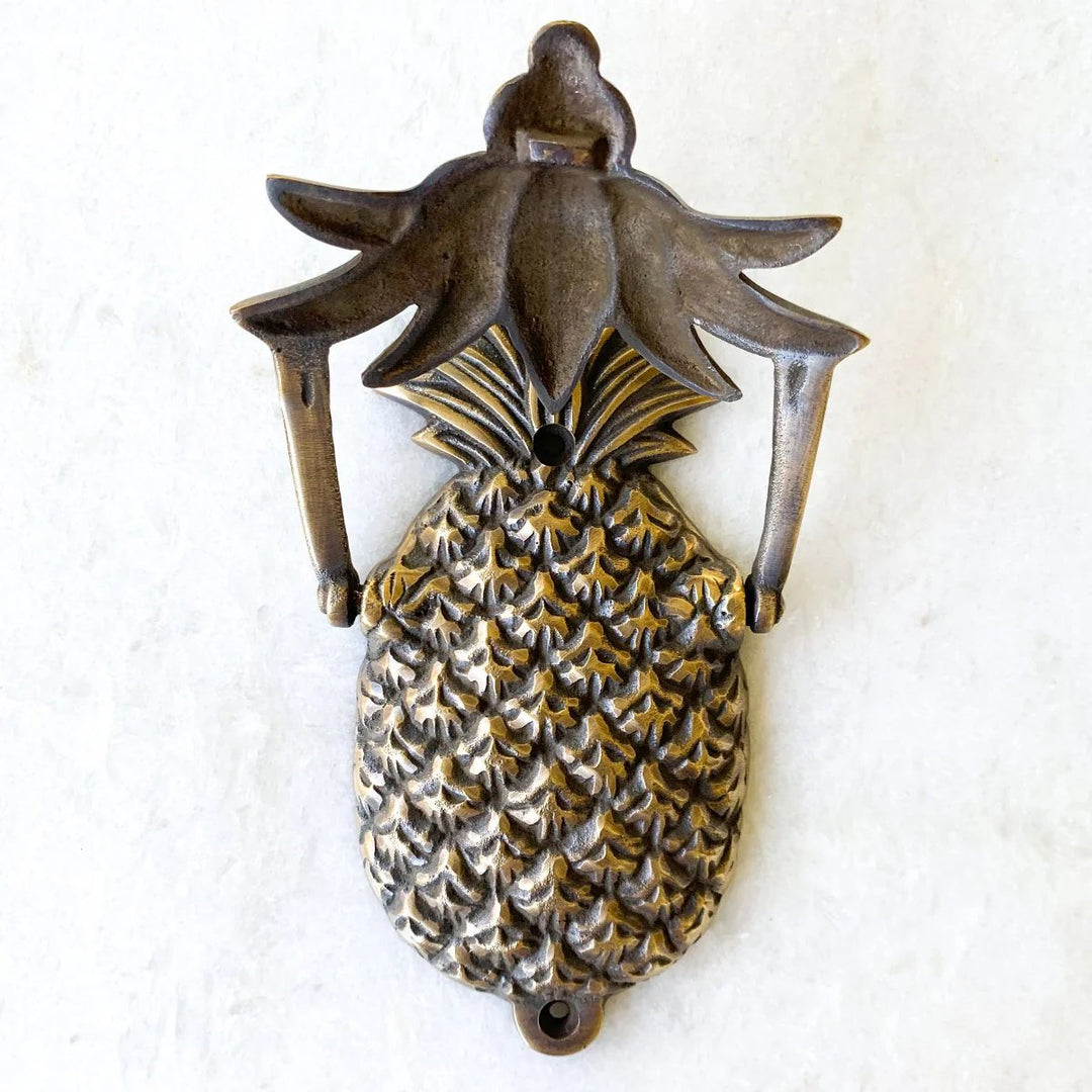Antique Brass Pineapple Door Knocker with knocker plate raised by Ocean Luxe