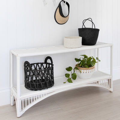 Carries rattan console table by Ocean Luxe